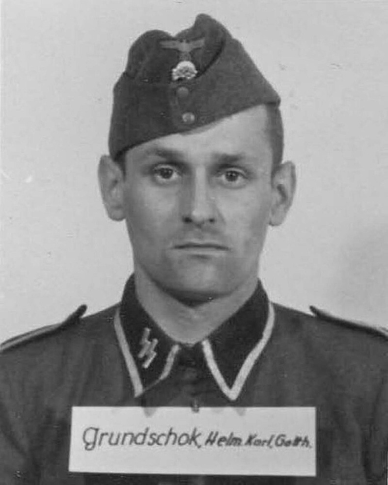 Хайнрих Грюндшок, сантехникч мэргэжилтэй. 1939 оноос SS-д алба хаах болсон